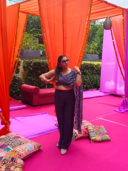 A fun, candid pose before the Mehendi event kicks off. It's all about feeling the vibe and getting ready to spread the excitement.
