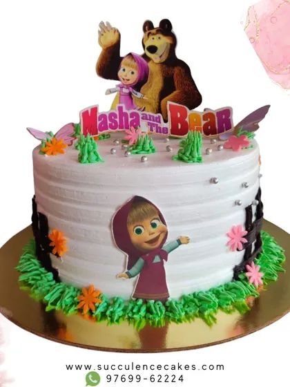 Here is a fun Masha and The Bear cake, bringing the beloved cartoon duo to a birthday party. I used edible prints and piped details to create a playful, woodland setting that kids adore.