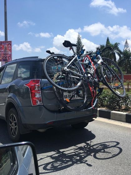 Getting the bikes ready for a ride far from the city. We often use car racks to transport our cycles to new and exciting starting points.