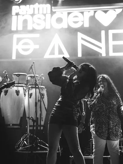A powerful moment captured during a Tanya Shanker Collective show. This black and white photo shows the artistic, indie vibe of my original music performances, perfect for venues like Fandom that crave a unique sound.