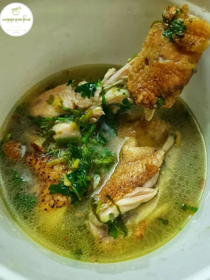 A simple and healthy country chicken soup, perfect for a light meal or when you're feeling under the weather.