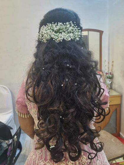 Expert Hairstyling & Saree Draping photo 13