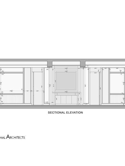 A sectional elevation drawing for the Jain Cosphere Office. This plan details the heights and arrangement of the partitions and furniture, ensuring a cohesive and well-proportioned interior.