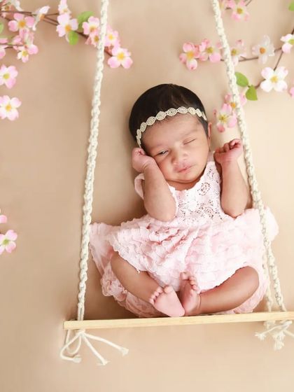 A little princess dreaming on a swing surrounded by cherry blossoms. This is one of my favorite props for creating a magical, fairytale feel.