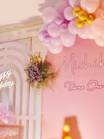 A duplicate image providing a clear view of the layered backdrop design, combining neon lighting, floral accents, and themed cutouts for a rich, textured look.