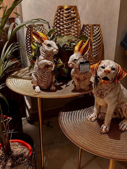 My store is full of unique finds, like these charming rabbit and dog figurines that add a whimsical touch to any corner.