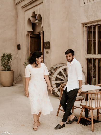 A candid moment captured in the charming, rustic alleys of Al Seef Heritage Hotel in Dubai.
