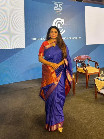 A full-length view of my attire and stage presence at the CCIL 25th Commemorative Event. I believe in dressing for the occasion, and for this high-profile government and corporate gathering, a formal and elegant look was essential to complement the stature of the event.