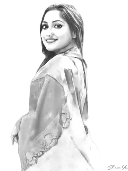 A portrait with a classic over-the-shoulder pose. I aimed to capture the grace in her look and the soft folds of her dupatta.