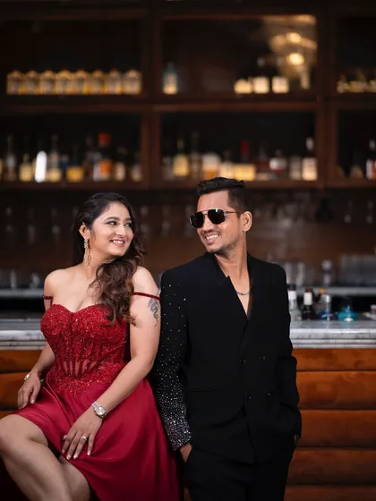 For Jinal's cocktail event, we went for a chic and modern glam look. Her radiant skin and defined eyes perfectly complemented her bold red dress, creating a sophisticated party-ready appearance.