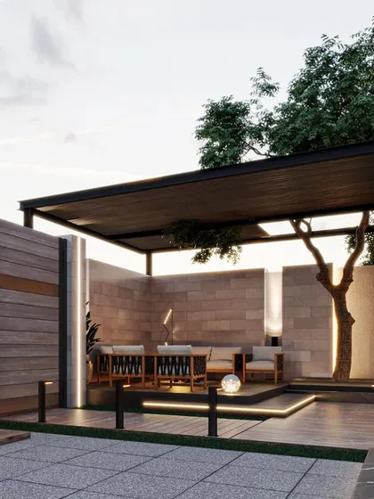 A backyard design concept featuring a raised seating deck under a modern pergola. The design incorporates a mature tree, building the structure around nature rather than replacing it.