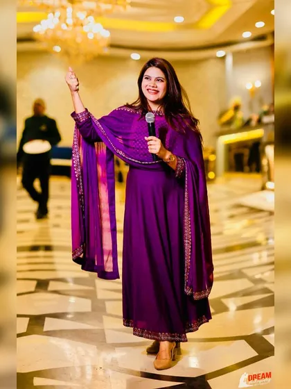 Dazzling in purple. This elegant anarkali was perfect for a sophisticated evening event.