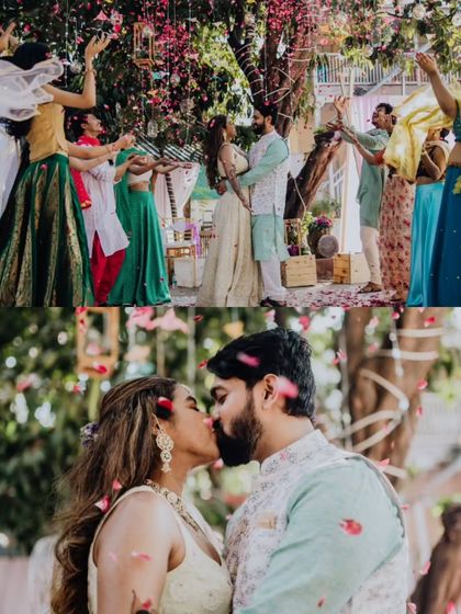 A kiss under a shower of petals at Anuradha and Pritam's intimate Mehendi function. A moment of pure romance amidst the celebration.