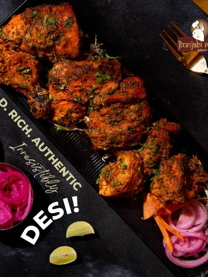 Our Tandoori Chicken is cooked the proper way, until it's smoky and juicy. We marinate it in authentic spices, so every bite is full of that classic tandoori flavour you love.