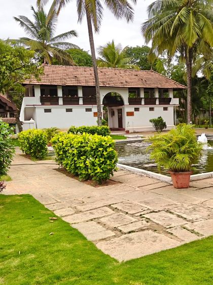 Our lush green campus during the pre-monsoon season. The pathways, lined with herbal plants and towering trees, invite you to wander and reconnect with nature and yourself.