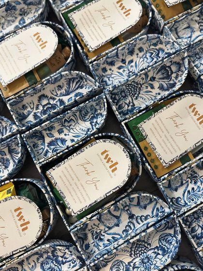 An array of our custom "Thank You" gift boxes. The consistent branding and beautiful design make a strong impression for corporate clients.