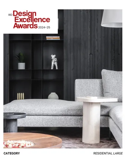 This living area, part of our award-winning design, features a backdrop of dark, charred veneer storage. The light grey sofa and soft textures create a comfortable space that is rich without being cluttered.