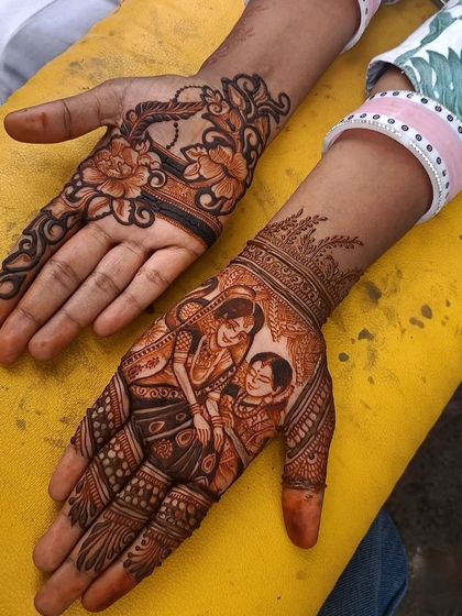 A heartwarming design for a baby shower. This mehendi features a mother lovingly holding her baby, a beautiful way to celebrate the special occasion. The other hand has a complementary floral design.