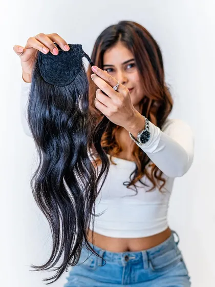 Here is a look at our 100% real human hair wrap-around ponytail. It's soft, sleek, and designed to give you an effortlessly glamorous look that feels completely natural.