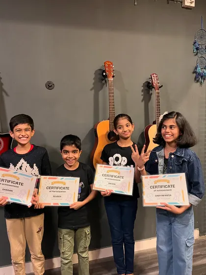 A group of our talented young achievers! These budding stars took home well-deserved prizes for their incredible art and music skills during one of our camp activities.
