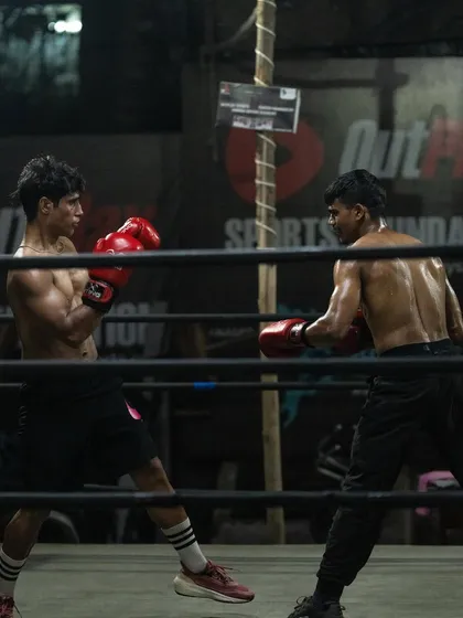 In the ring, it's all real. This is a glimpse of an intense sparring session between two of my dedicated fighters. We practice real fight scenarios to sharpen reflexes, improve defense, and build ring awareness.