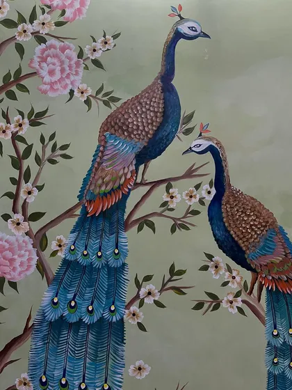 A detail of the two peacocks, showing their graceful poses.
