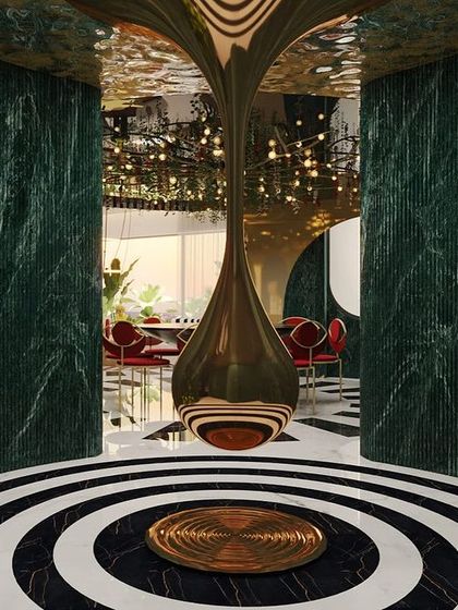 A glimpse into our 'Whimsy Wonder' project, a maximalist experience center where art and luxury collide. Here, green marble, bold patterns, and a dramatic central sculpture create a wonderland of playful opulence.