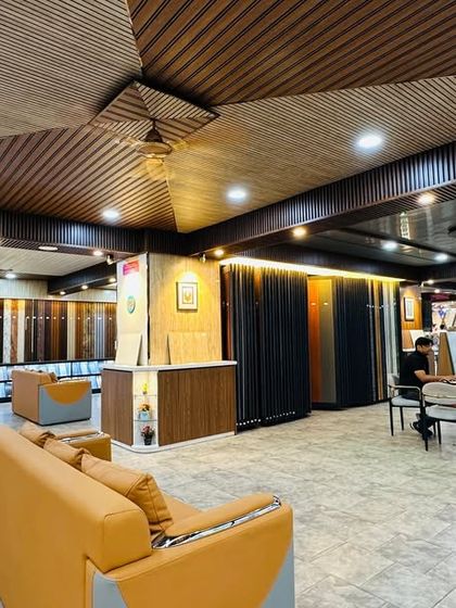 A panoramic view of our showroom, highlighting the spacious layout and the variety of seating areas for customer comfort.