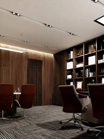 Another angle of the executive office, showing the wood-paneled wall and integrated lighting. The design ensures a cohesive and high-end feel throughout the space, from the meeting area to the personal workspace.