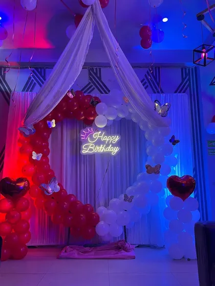 The setup includes a canopy over the balloon heart, adding a touch of elegance.