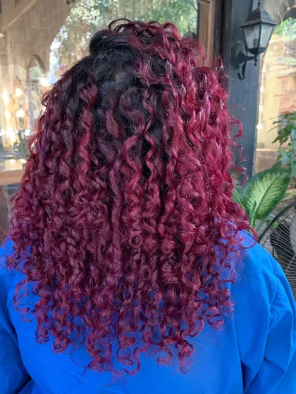 Another view of the 'Pomegranate Sangria' curls, showing the beautiful dimension and texture of the color.