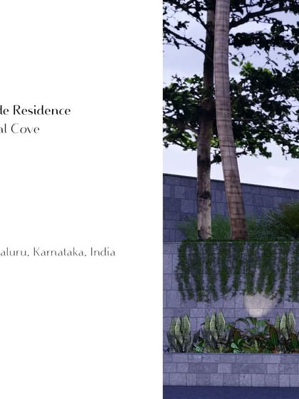 A minimalist graphic showcasing the Hegde Residence, also known as Kodial Cove, in Mangaluru. The image focuses on the textural detail of the stone boundary wall and the lush, cascading greenery that defines the property's edge.