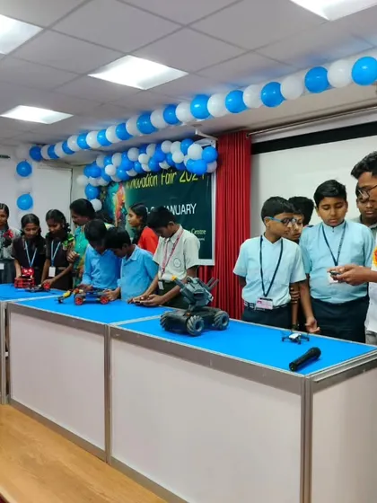 Students from a local school get a hands-on demonstration of various robotic projects at an Innovation Fair. We love participating in community events to spark curiosity in science and technology.