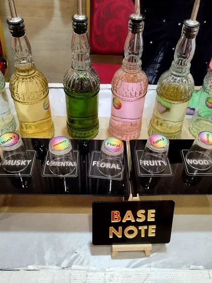 A close-up of the custom perfume bar, showing the different base notes guests could choose from. Details like this elevate the guest experience from ordinary to extraordinary.