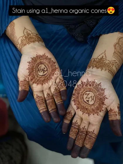A beautiful example of a personalized mandala design, with initials in the center. This shows the versatility of my organic henna cones for creating custom party and bridal looks.