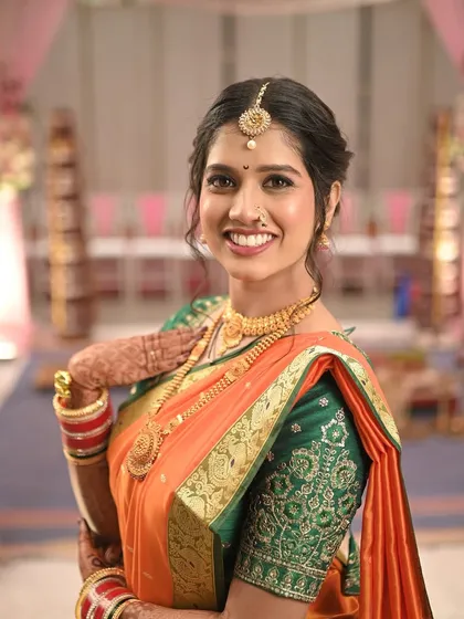 A happy bride is the most beautiful bride. This portrait captures her genuine smile and the glow of her special day.