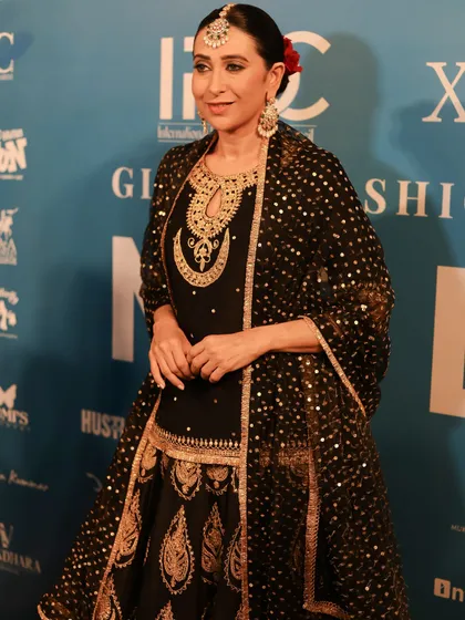 Our students get exclusive backstage access to major fashion events like Global India Couture Week. Here you see them working with celebrities like Karisma Kapoor, gaining invaluable industry experience.