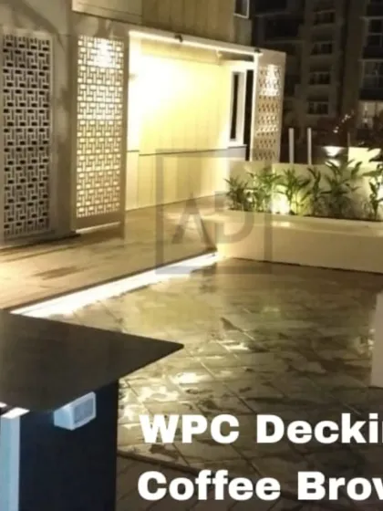 A wide perspective of the terrace deck, showing how it connects different parts of the outdoor space. WPC decking is a smart investment to increase your home's living area.