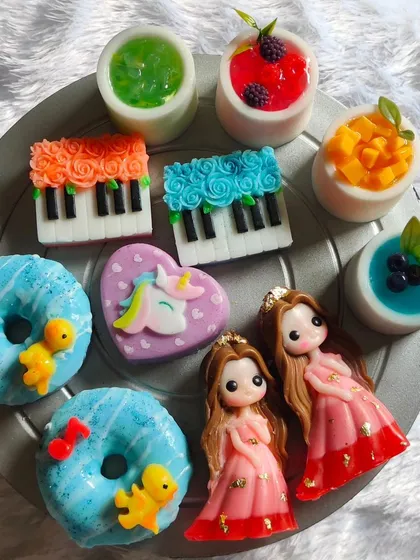 A top-down view of the colorful and artistic soap collection, perfect for any party theme.