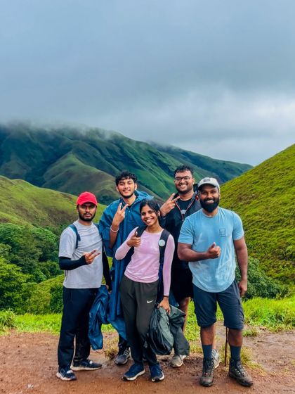 Friends enjoying the view from a high point on the Kudremukha trail. The shared experience makes it even more special.