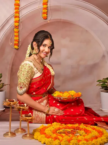 Bring your festive celebrations to the studio. For this Diwali-themed shoot, we created a complete traditional setup with a flower rangoli and glowing diyas to capture the perfect festive portrait.