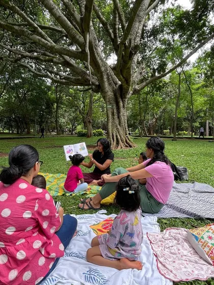 A guest storyteller reads a Peppa Pig book, adding a fun and familiar element to the session. We love when parents from the community join in to share stories.