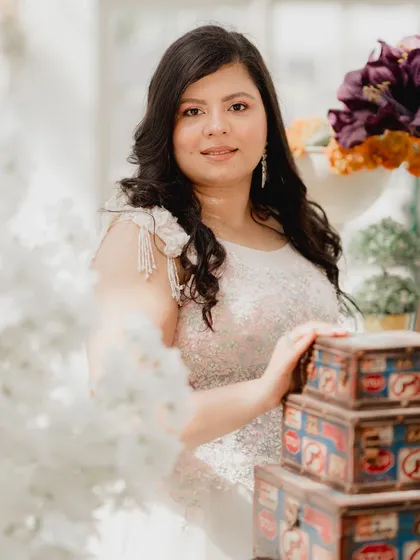A lovely solo portrait of the bride at Picture Villa. The soft lighting and vintage props create a beautiful, classic look.