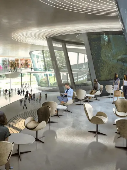 The passenger lounge offers a comfortable and modern waiting area with views of the surrounding activity and green spaces.