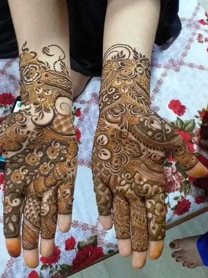 Intricate and dense, this design is for the bride who wants a very traditional and full mehndi look. Every part of the hand is adorned with detailed patterns.