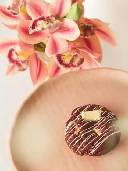 Indulge in the perfect blend of soft red velvet and rich cream cheese filling. This cookie is as decadent as it is delightful.