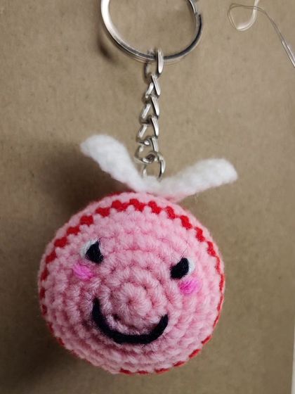 My super popular bumblebee keychains. They come in the classic yellow and black, but I also make them in fun colors like pink, blue, and purple.