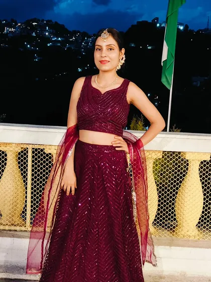 Dressed in a traditional lehenga for an evening wedding ceremony. It is an honor to host the main event, and I always dress to respect the occasion's sanctity and style.