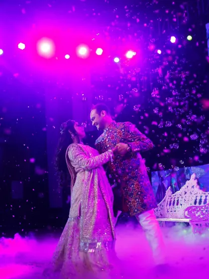 A romantic couple's dance surrounded by bubbles and beautiful lighting. We help create a magical atmosphere for your first dance as a married couple.