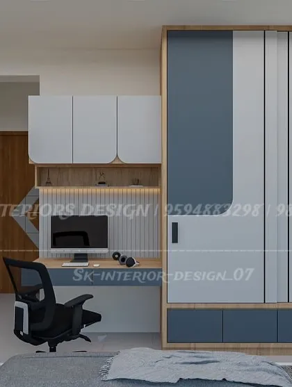 A great solution for a kid's room, this design combines a dual-tone sliding wardrobe with a built-in study desk. The layout is space-efficient and provides plenty of storage.